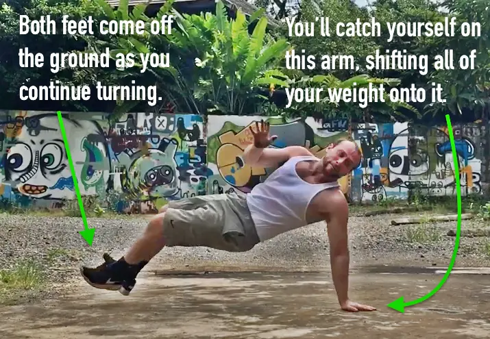 360 pushup tutorial fourth step - catch yourself on one arm and continue spinning