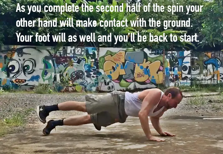 360 pushup tutorial sixth step - as you complete the second half of the spin, your other hand will make contact with the ground and you'll be back to the starting position