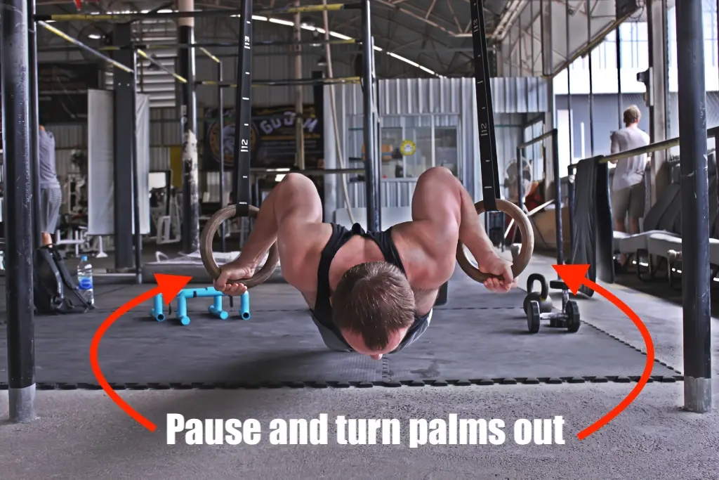 Turning palms out at near the bottom of the deficit pushup