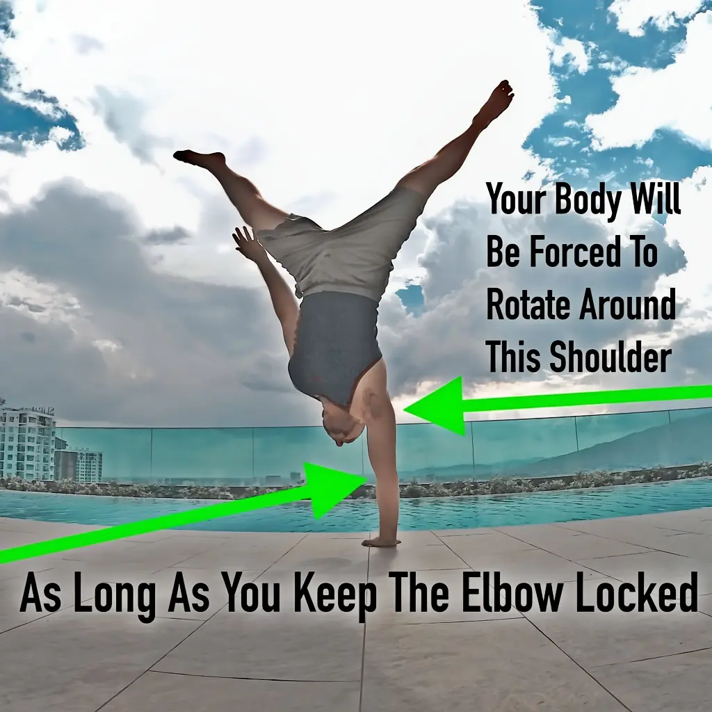 Showing the mid-point of a properly executed handstand bail.