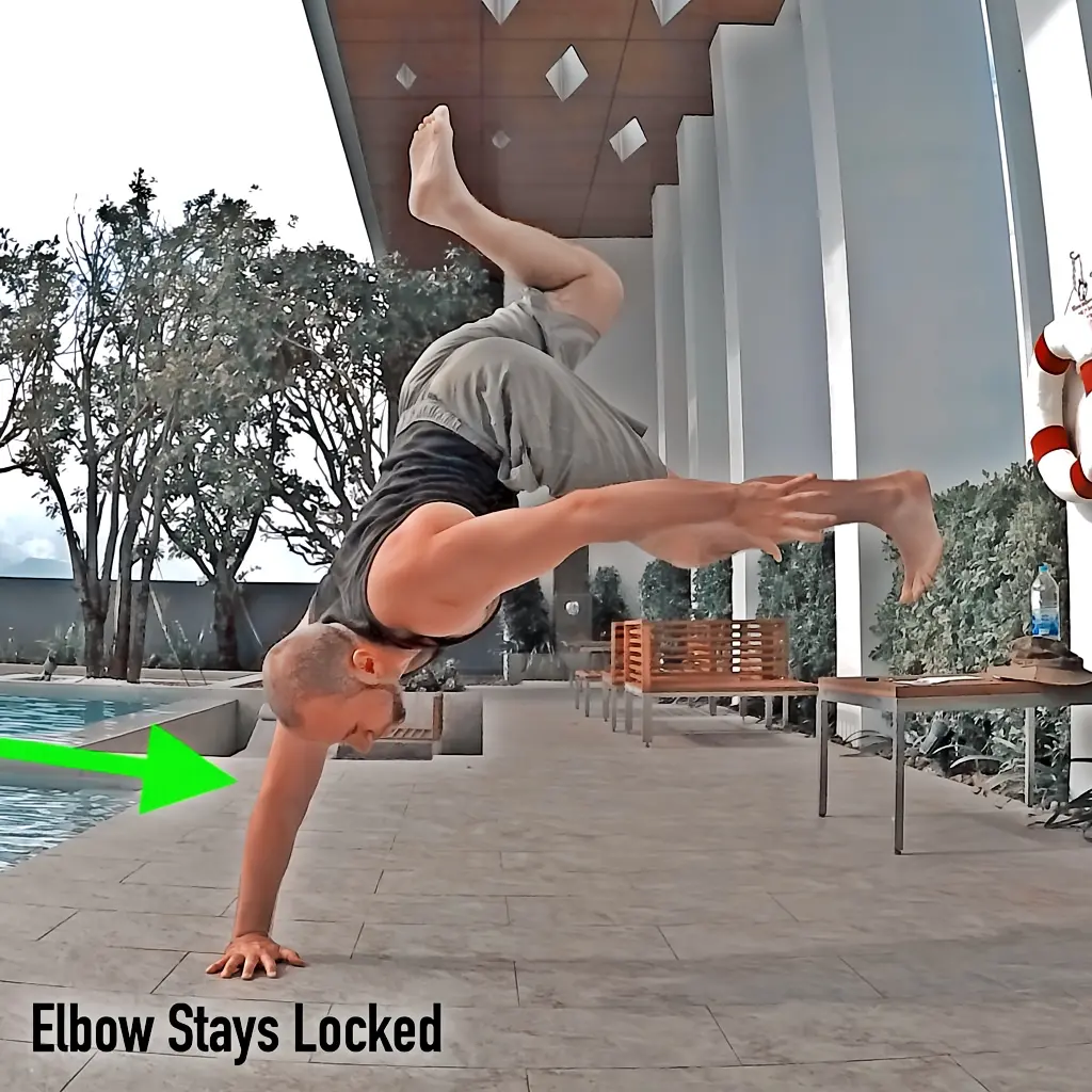 Showing how to bail out of a handstand with the support arm elbow fully locked out.