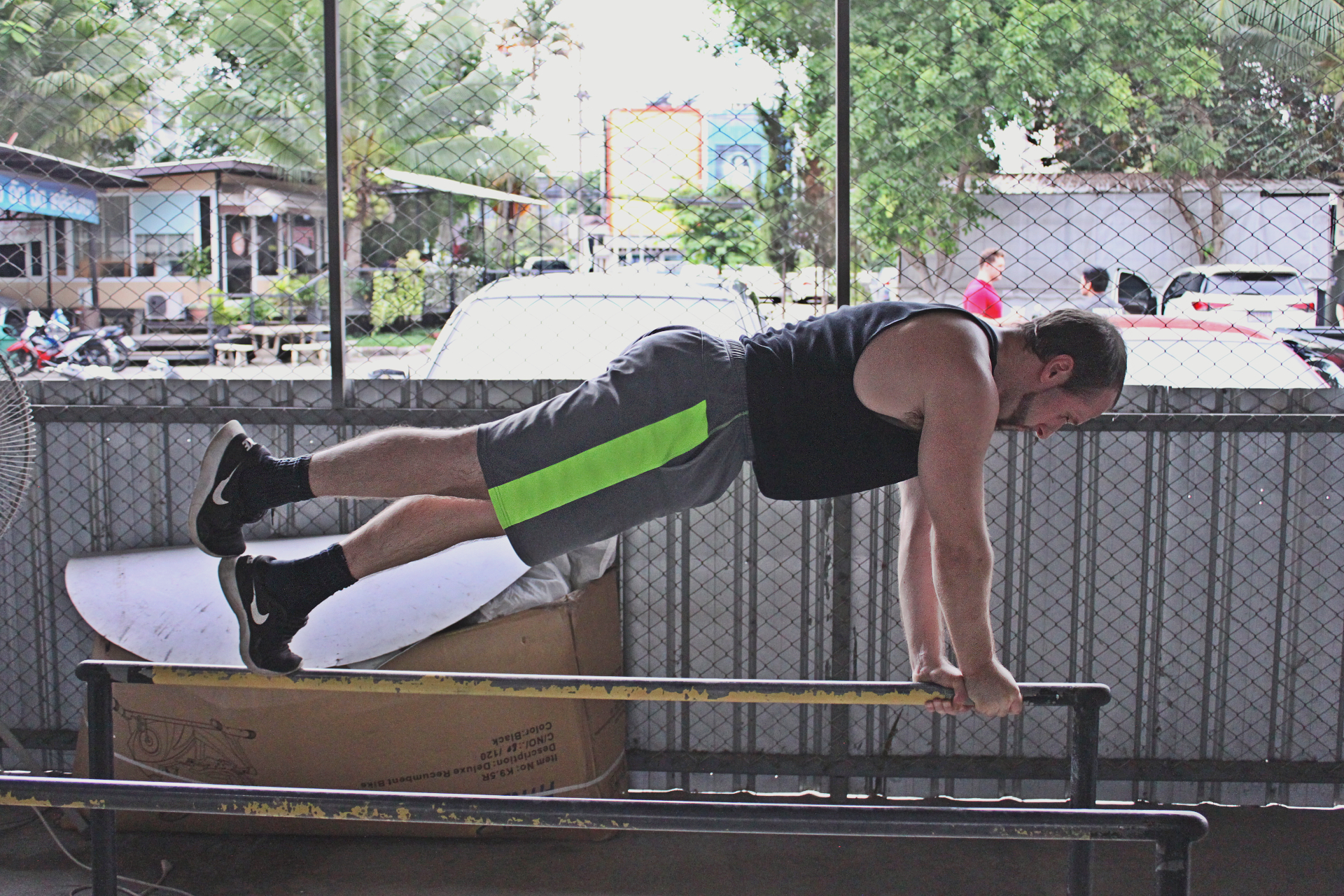 Top part of the range of motion in an iguana pushup