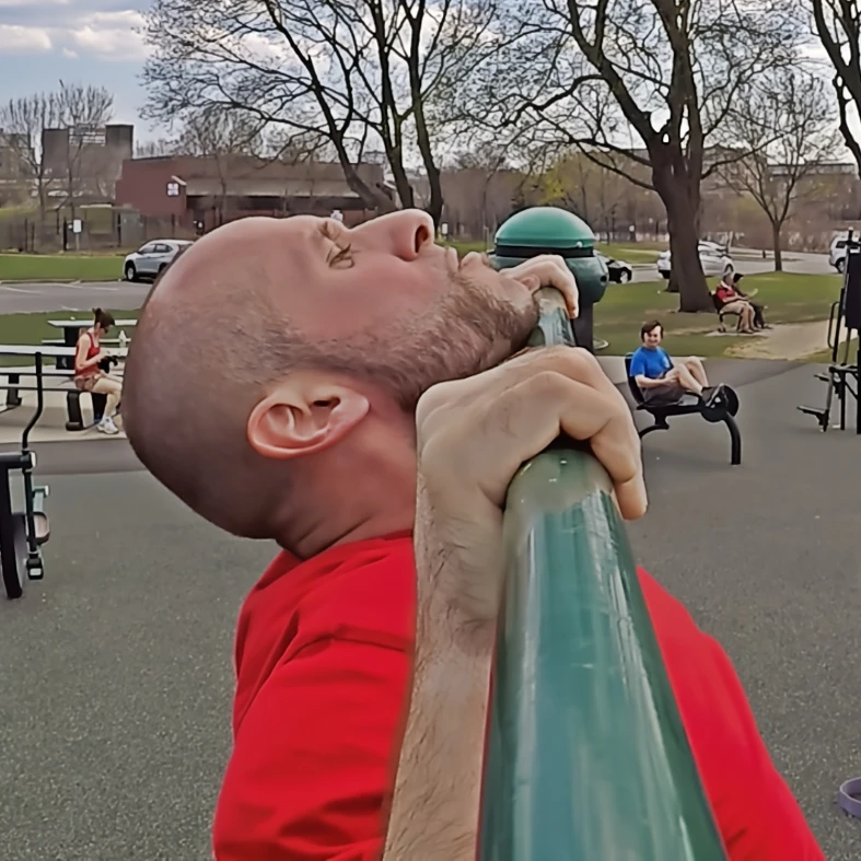 Military-style pullup with chin clearing the bar