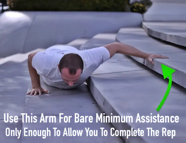 Self-assisted one arm pushup progression 2 - bottom position