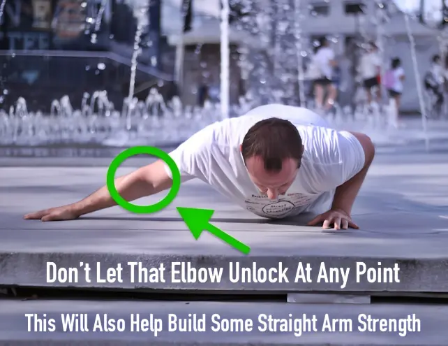 Archer pushup demonstration with left hand working