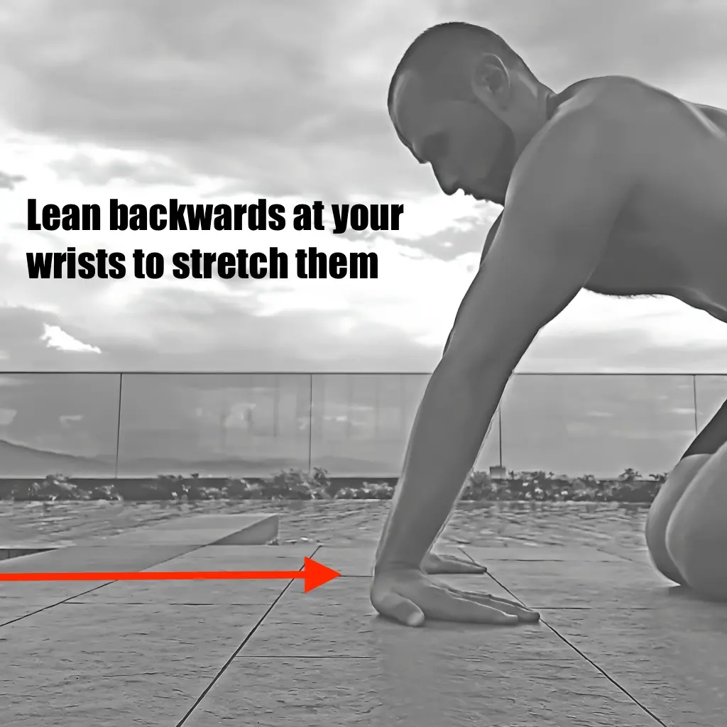 Warming up wrists to prepare for elbow lever work